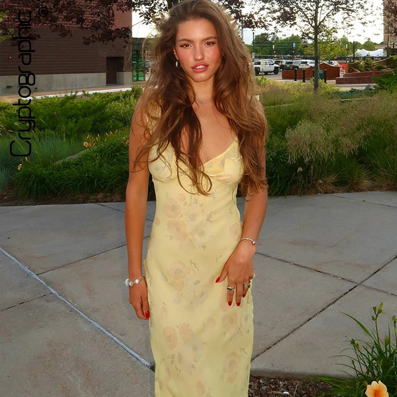 Abito lungo senza schienale con scollo profondo e motivo floreale