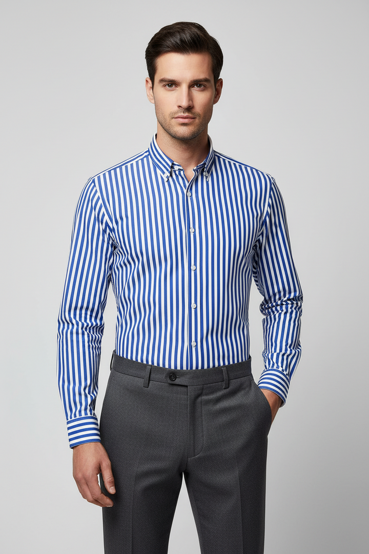 Folded blue and white striped shirt on a white background