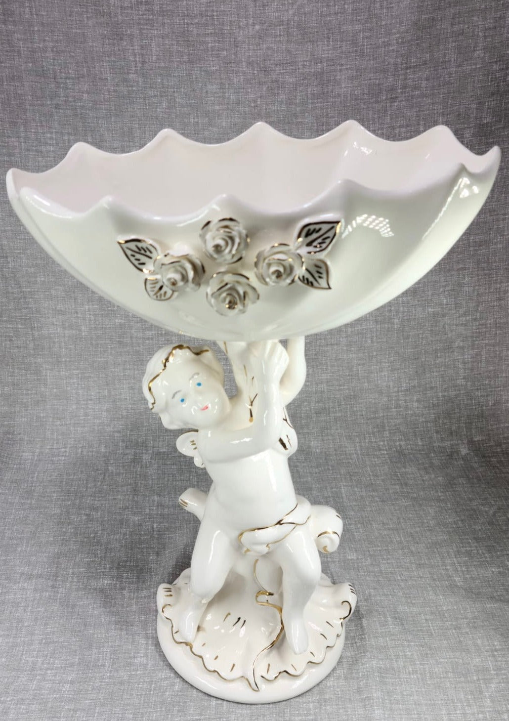 White Ceramic angle with bowl on top